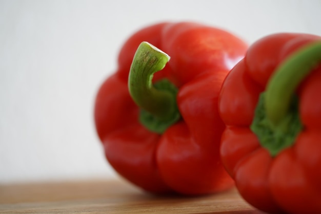 Close-up of red bell peppers on table