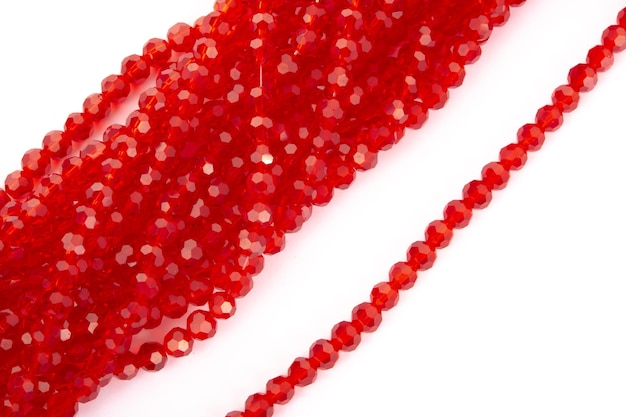 Photo close-up of red berries over white background