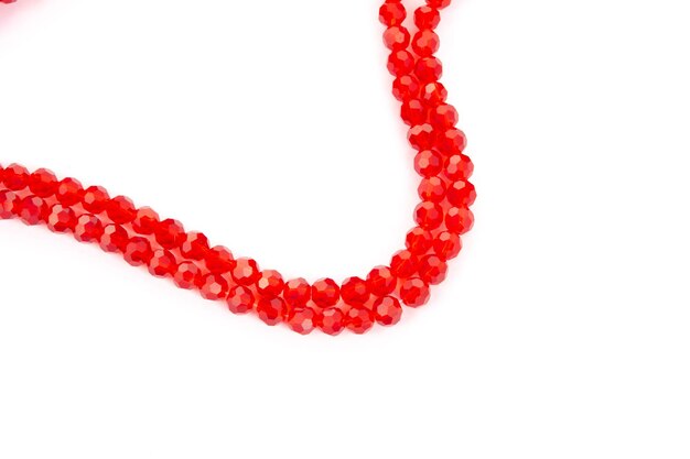 Photo close-up of red berries on white background