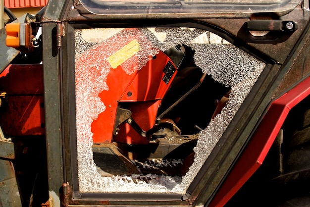 Close-up of red car on road