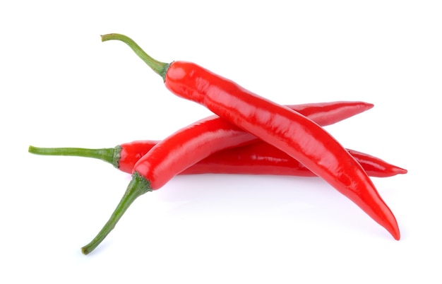 Close-up of red chili pepper against white background