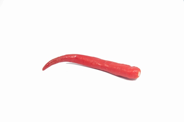 Photo close-up of red chili pepper over white background