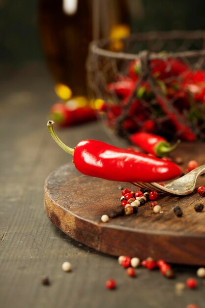 Close-up of red chili peppers on table