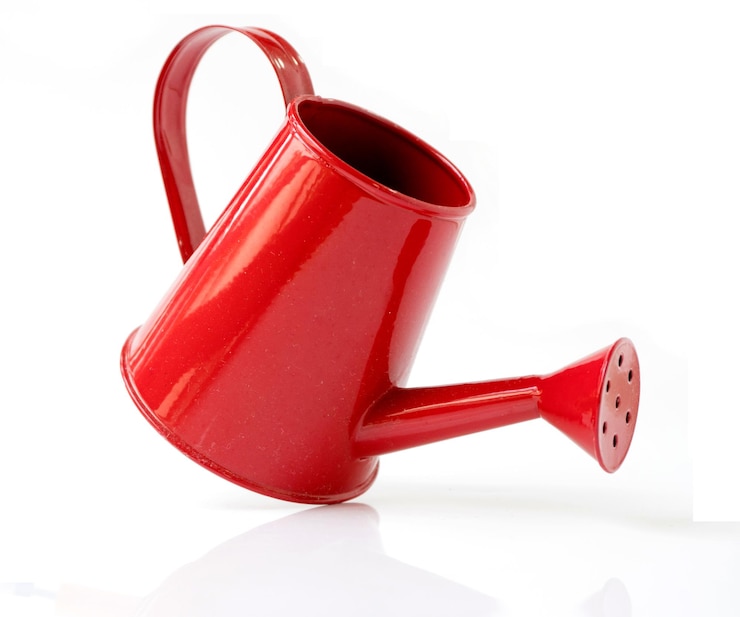 Photo close-up of red coffee cup against white background