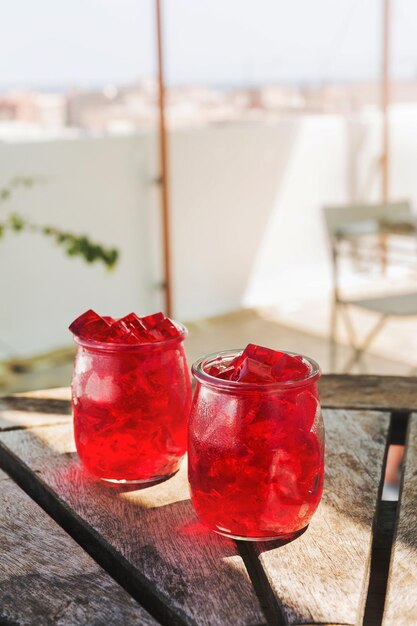 Close-up of red drink on table