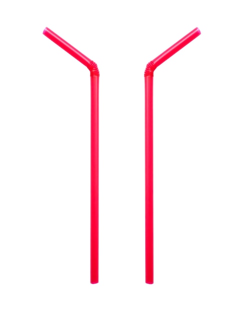 Close-up of red drinking straws on white background