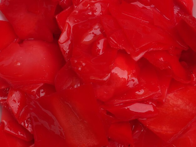 A close up of a red food item