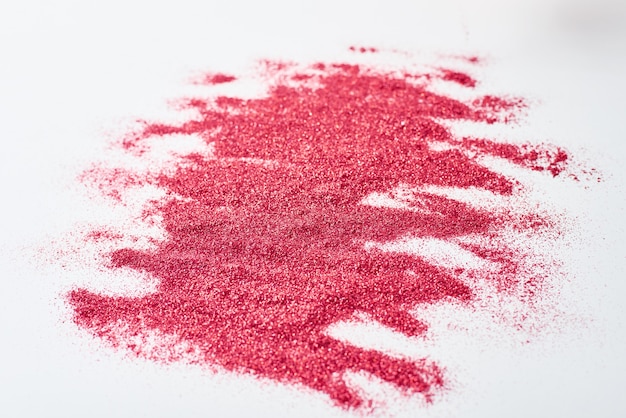 Close-up of red glitter texture