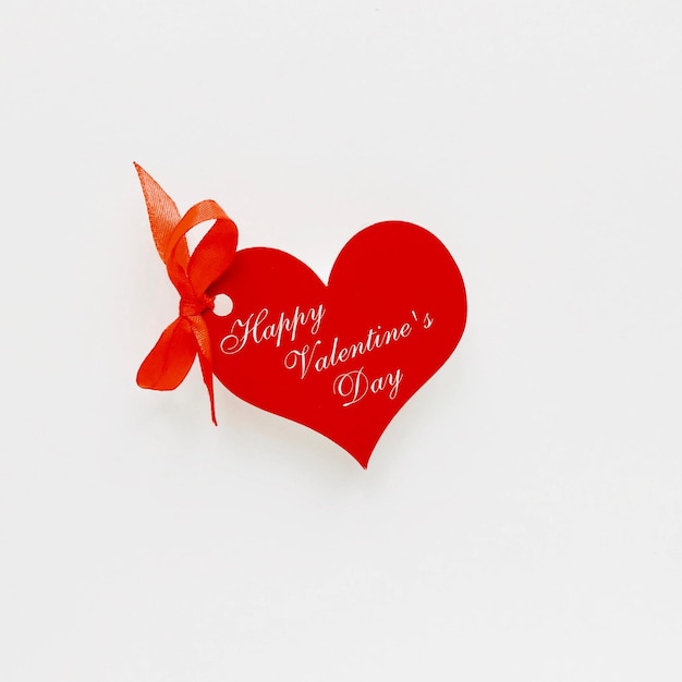 close-up of red heart shape on white background