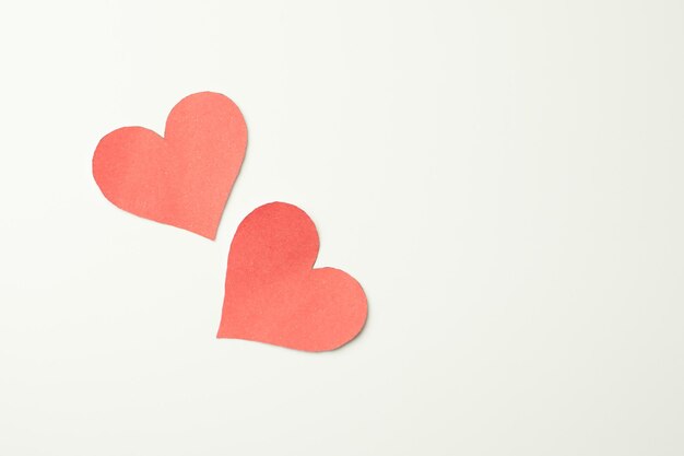 Photo close-up of red heart shape on white background