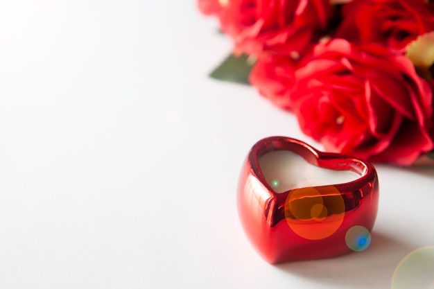 Close up red heart on white background with red rose, Valentine concept