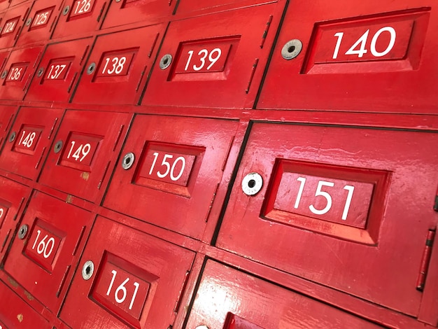 Photo close-up of red lockers in room