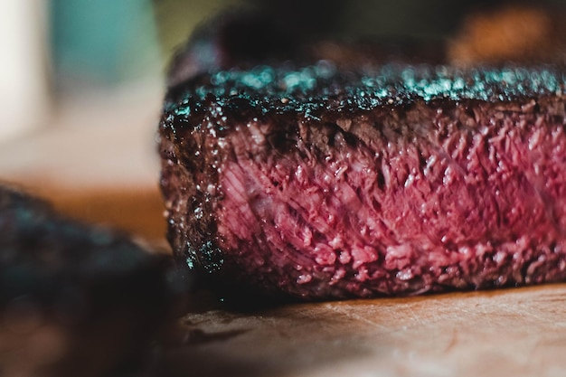 Close-up of red meat on table