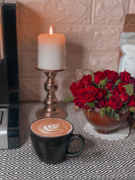 Close-up of red roses on table