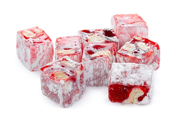 Close up of red Turkish Delight sweets isolated on white background