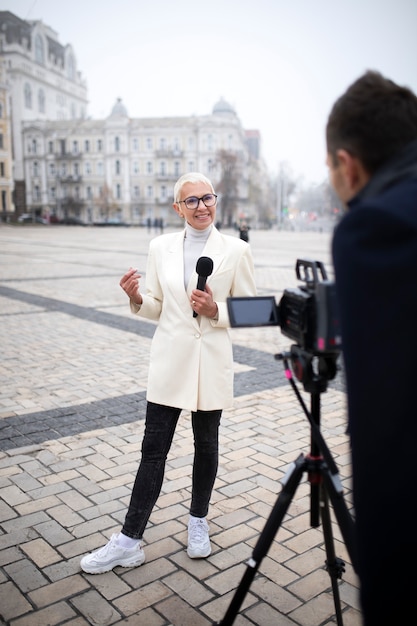 Photo close up on reporter preparing for an interview