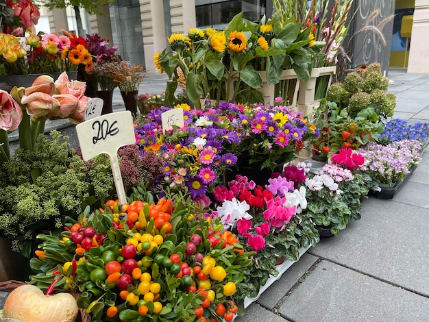 Close up of retail display of street flower shop on the\
city