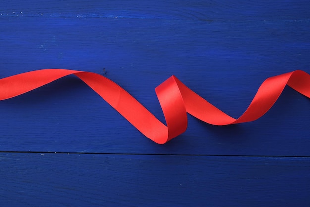 Close-up of ribbon on blue background