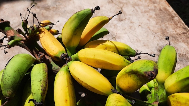 Close up, Ripe bananas on a cement wall background 03