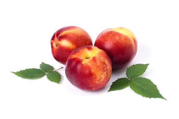 Close up on ripe beautiful peaches isolated