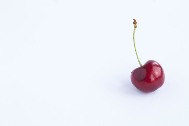 Close up on ripe cherry with tail