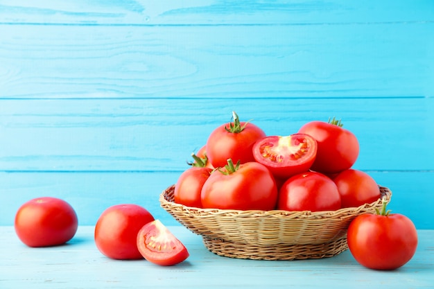 Close up on ripe pile of tomatoes in basket