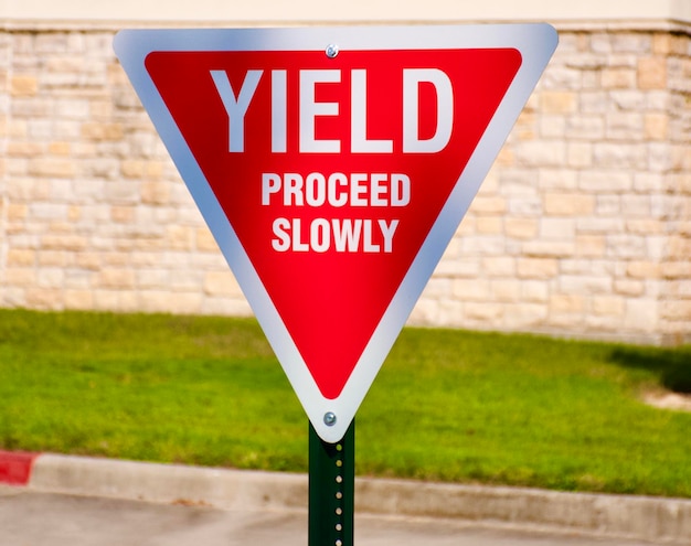 Photo close-up of road sign on wall