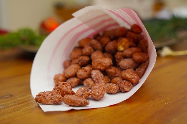 close-up to Roasted almonds in christmassy dekoration