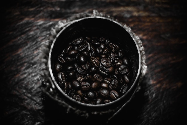 Close-up of roasted coffee beans on table