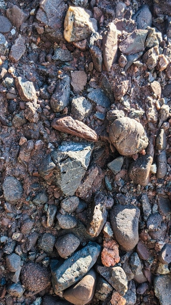 a close up of rocks and gravel on the ground