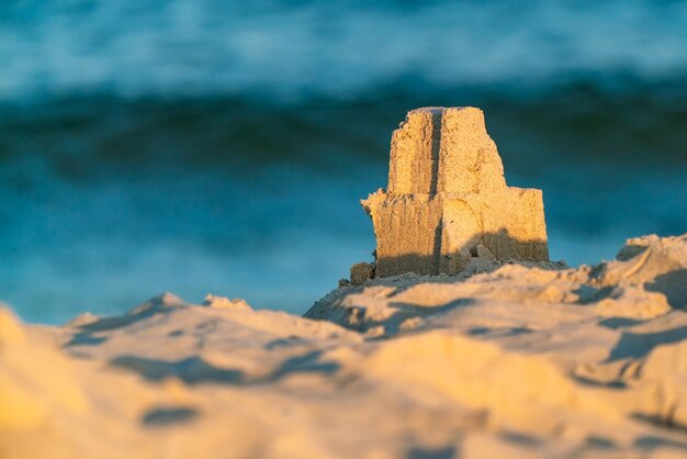 Close-up of rocks on rock against sky