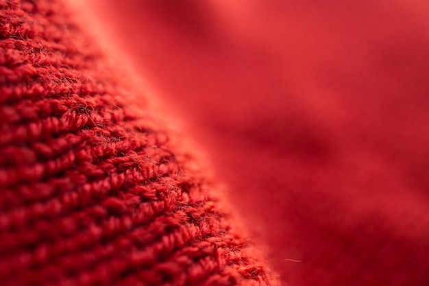 Close-up rode gebreide wollen stof textuur achtergrond