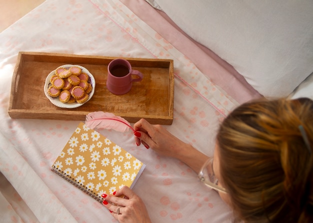 Close up on romantic breakfast bed arrangement