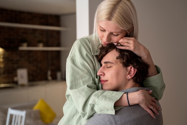 Close up romantic couple hugging