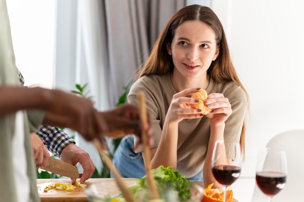 Close up roommates with food indoors