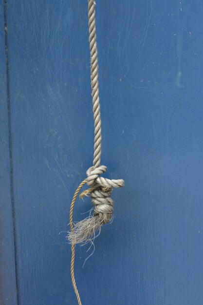 Photo close-up of rope against wall