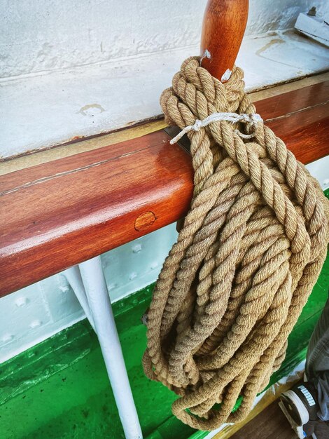 Close-up of rope tied to bollard