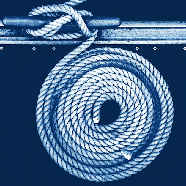 Close-up of rope tied on metal