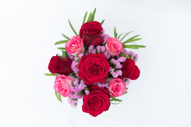 Photo close-up of rose bouquet against white background