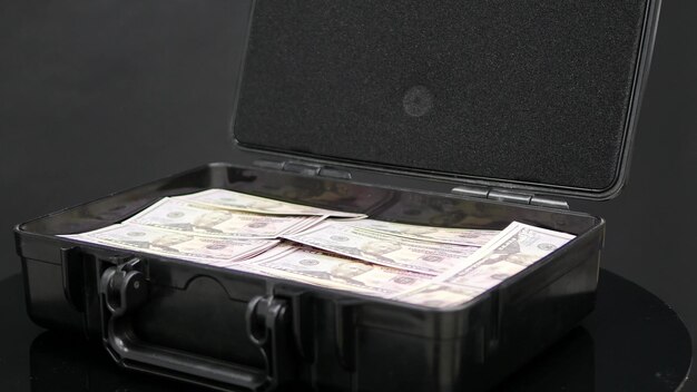 close up rotation of case full of one million dollars