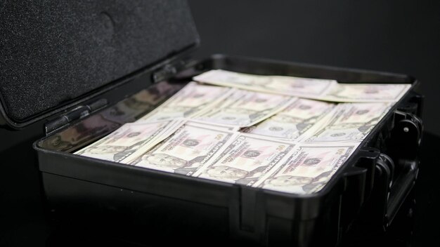 close up rotation of case full of one million dollars