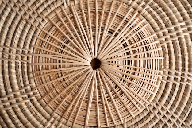 Close up to Round Circle woven straw mat Wicker pattern of local Thai handmade craft