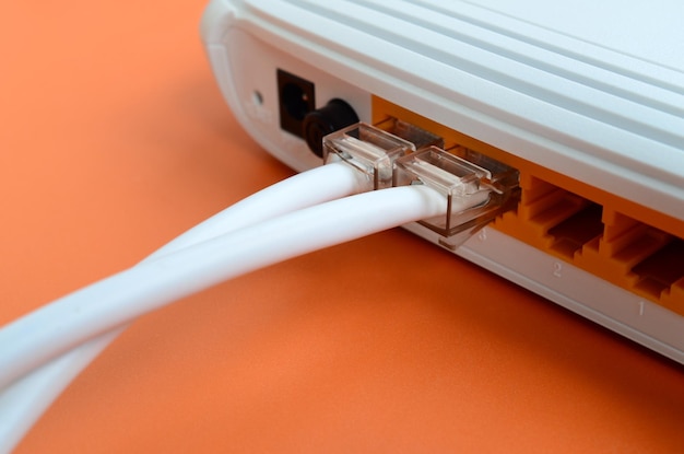 Photo close-up of router and cable on table