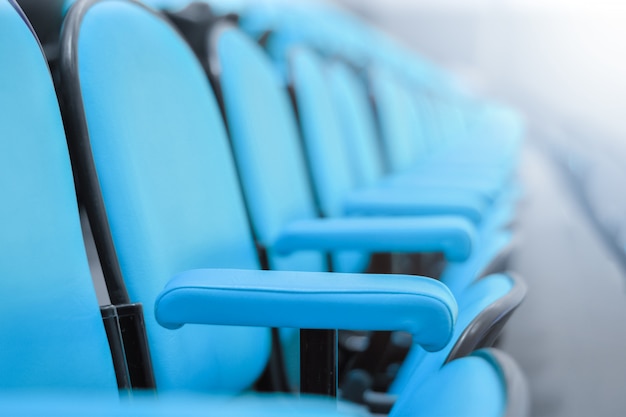 Close up Row of chairs in boardroom. seats in an empty conference room