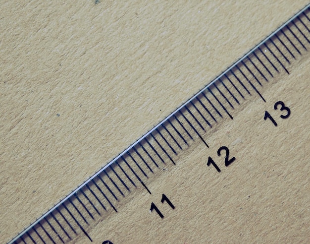 Close-up of ruler on paper