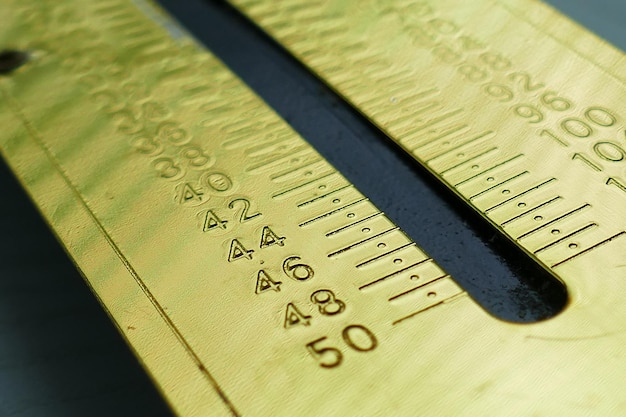 Close-up of ruler on table