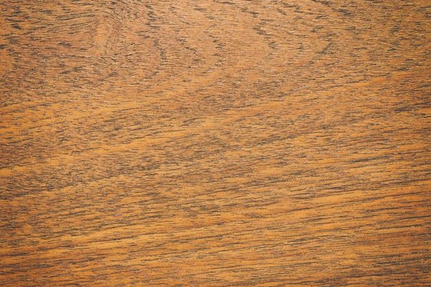 Закройте вверх по деревенской деревянной таблице с текстурой поверхности зерна в винтажной предпосылке стиля.