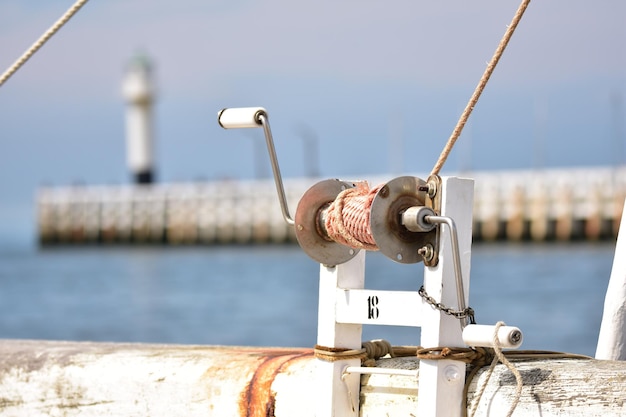 Close-up of rusty railing against sea