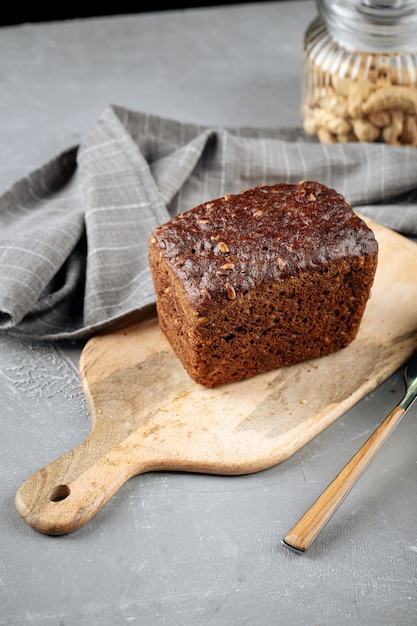 Close up on rye whole grain bread on cutting board