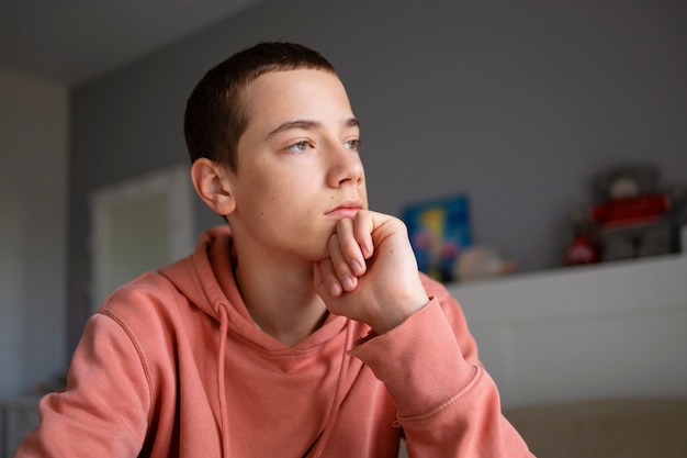 Photo close up on sad boy portrait